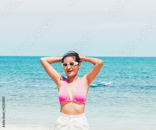 beach woman posing for a photo smiling happy