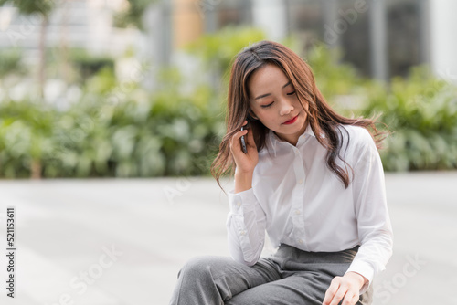 Asian business women working outdoors