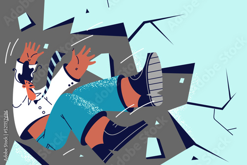 Businessman falling from cliff