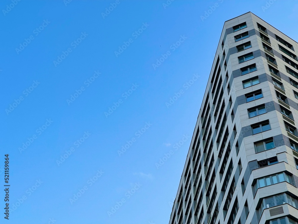 Modern office building on blue sky background Modern office building on blue sky background