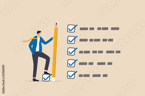 Getting things done, completed tasks or business accomplishment, finished checklist, achievement or project progression concept, businessman expert holding pencil tick all completed task checkbox. photo
