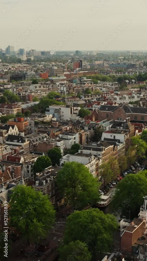 Bird's eye view of the streets of old city of Amsterdam with traditional houses Bird's eye view of the streets of old city of Amsterdam with traditional houses