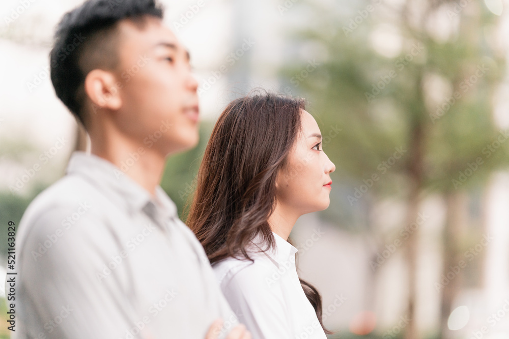 Asian business men and women working partners outdoors Asian business men and women working partners outdoors