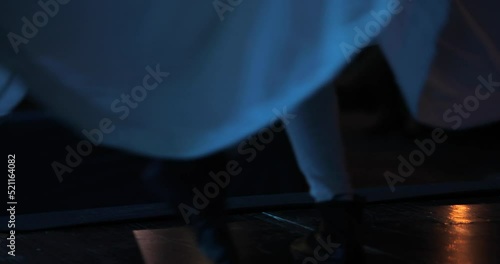 Footage of two dervish performing the dervish dance