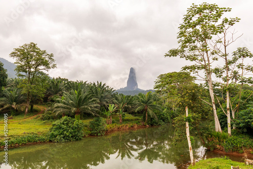 The volcanic plug peak, Pico Cão Grande, on the island of São Tomé, shooting out of the jungle landscape surrounding it.