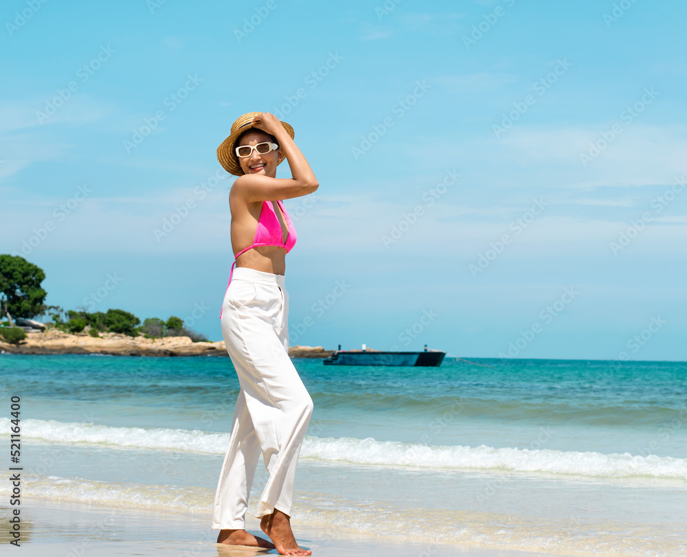 beach woman posing for a photo smiling happy beach woman posing for a photo smiling happy