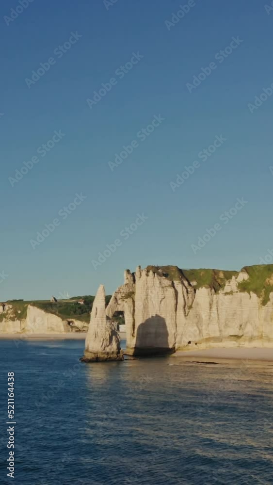 Natural rocks on the banks of the English Channel, forming natural arch, Etretat Natural rocks on the banks of the English Channel, forming natural arch, Etretat