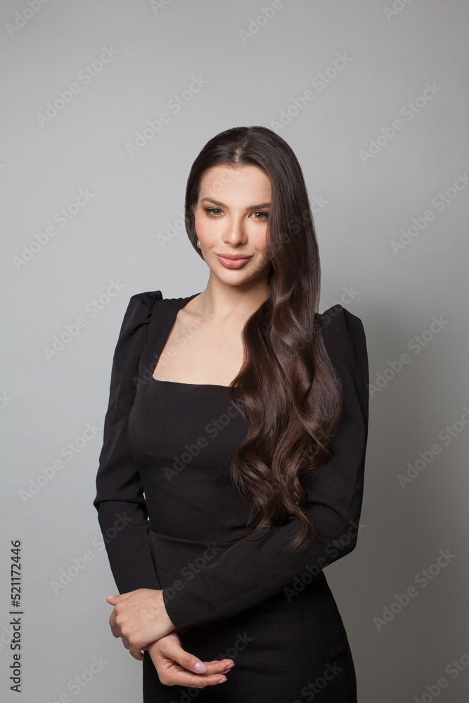 Portrait of attractive model woman brunette standing on white background Portrait of attractive model woman brunette standing on white background