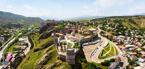 Aerial fly over Akhaltsikhe Castle in Georgia. This is a medieval fortress built in the IX century photo