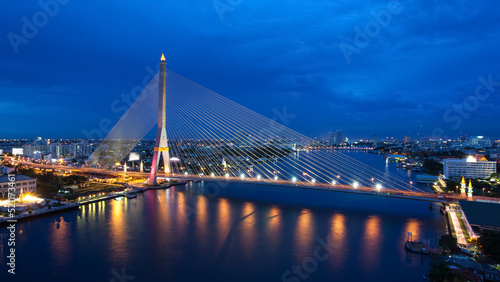 The Bridge across the river at dusk, Rama VIII bridge (Bangkok, Thailand)