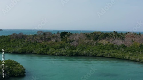 Cartagena - Flying above a tropical island covored with palm trees photo