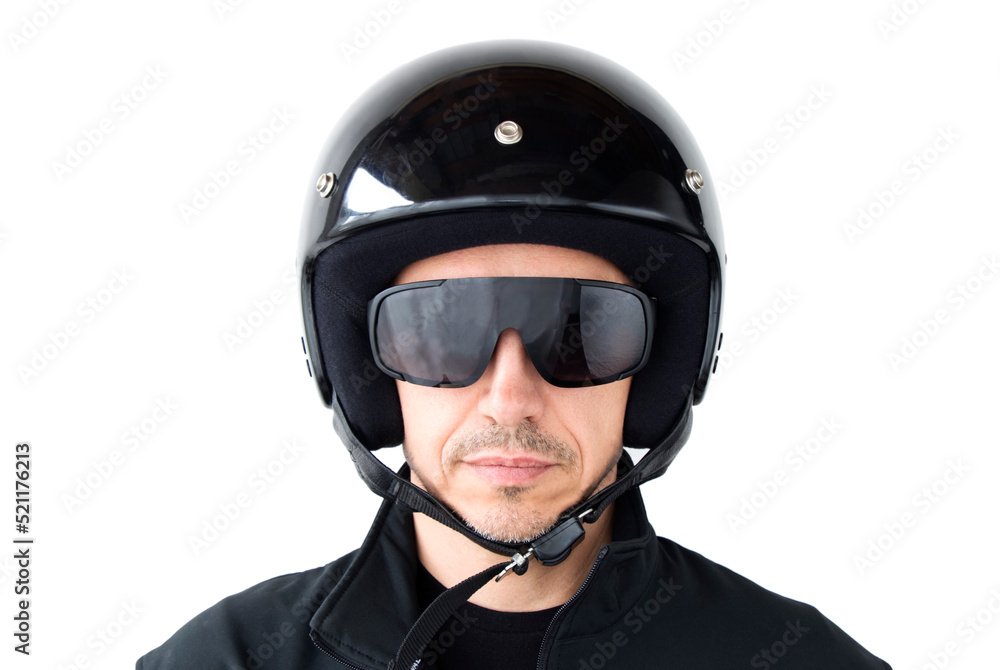 Portrait of a motorcyclist in a protective black helmet on an isolated white background. Safe ride concept. Portrait of a motorcyclist in a protective black helmet on an isolated white background. Safe ride concept.