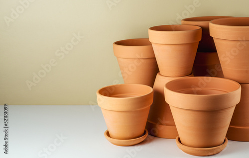Group of empty ceramic flower pots with copy space