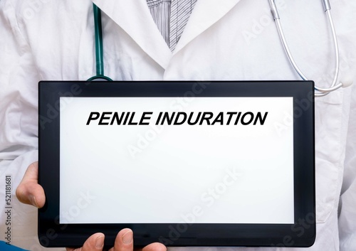 Penile Induration.  Doctor with rare or orphan disease text on tablet screen Penile Induration photo