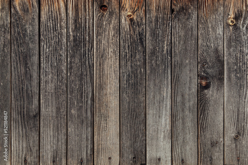 Old wood texture. Vertical boards with knots and nails, copy space