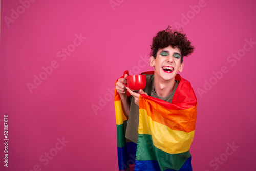 Happy guy with a gay flag in his hands. 