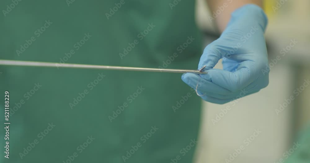 4K Real Time - Practice of a surgery using the laparoscopy technique - details of needles, gloves, microscope... 4K Real Time - Practice of a surgery using the laparoscopy technique - details of needles, gloves, microscope...