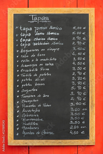Blackboard with tapas of day written in chalk in a Spanish bar