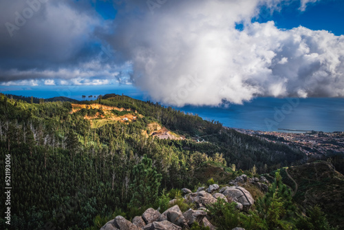 Stunning landscape of Mountains with clouds seen from the Lombo do Mouro Viewpoint at Madeira Island. October 2021