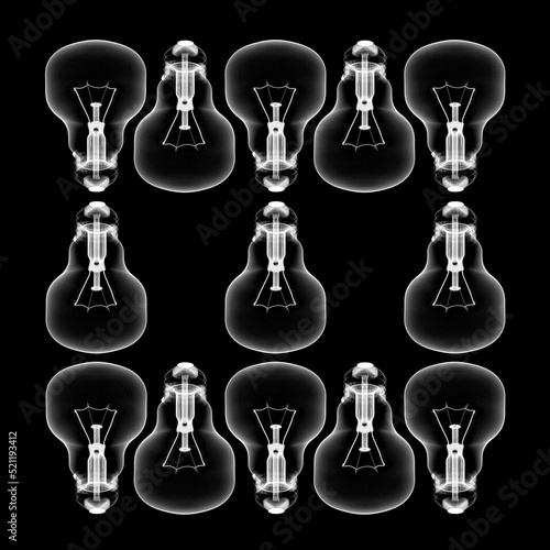 Arrangement of x-ray images of vintage light bulbs