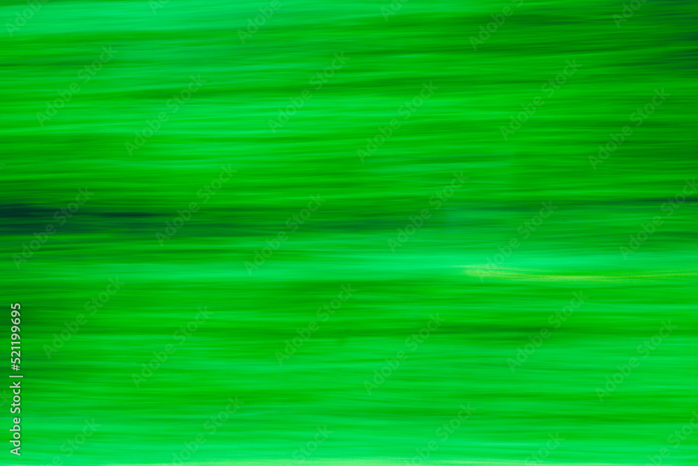 Abstract Green trees motion blurred green leaves background. Abstract Green trees motion blurred green leaves background.