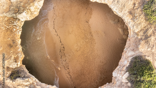 Drone view of Praia de Benagil. Bengali cave. photo