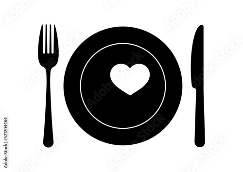 Black plate with heart knife and fork isolated on a white background.