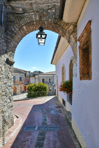 A small street between the old houses of Savignano Irpino, one of the most beautiful villages in Italy. photo