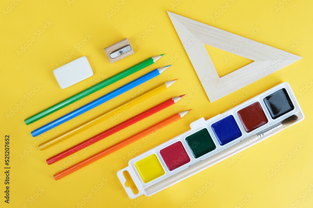 Drawing materials colored pencils, watercolors, an eraser, a