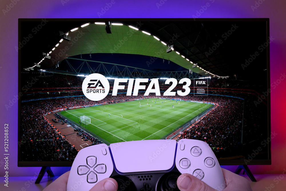 Kid play FIFA 23 with Playstation 5 controller , 4 aug, 2022, Sao Paulo,  Brazil. Stock Photo