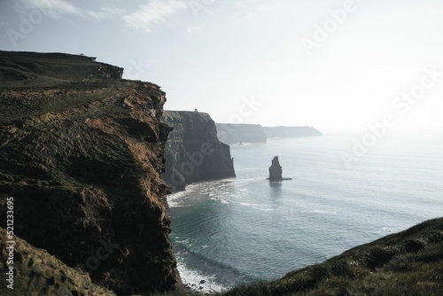 Scenic cliff view near a calm sea photo