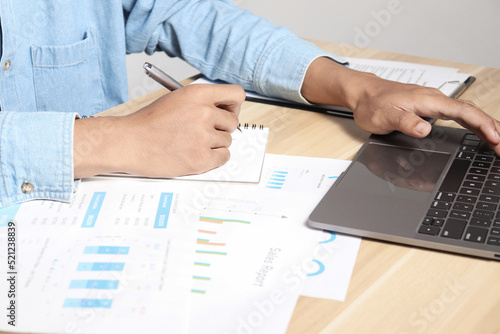 Financial charts on office desk. Home office work space. financial accounting strategy analysis concept