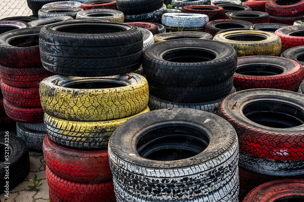 Pile Of Old Used Car And Bike Tyres Representing Hazardous Waste And Material For Recycling Rubber Pile Of Old Used Car And Bike Tyres Representing Hazardous Waste And Material For Recycling Rubber