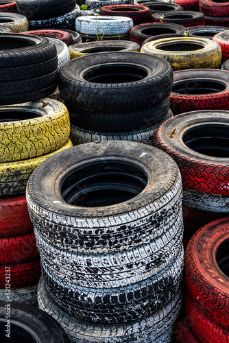 Pile Of Old Used Car And Bike Tyres Representing Hazardous Waste And Material For Recycling Rubber 