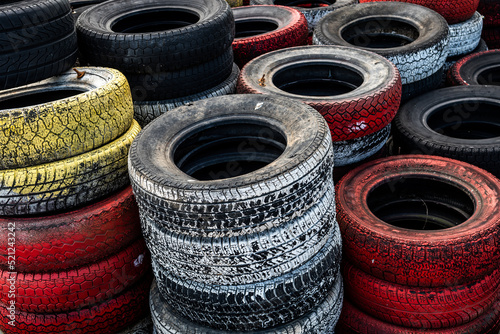 Pile Of Old Used Car And Bike Tyres Representing Hazardous Waste And Material For Recycling Rubber 