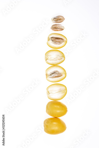 yellow raw dates isolated on white background