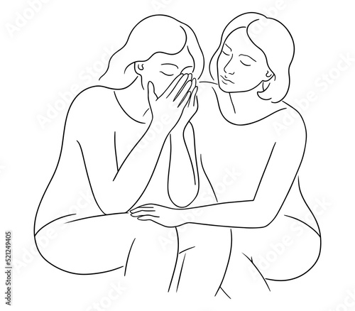 Two sad girlfriends are sitting together. Upset woman covers her face with her hands and crying. Person is going through hard times. Woman supporting her friend