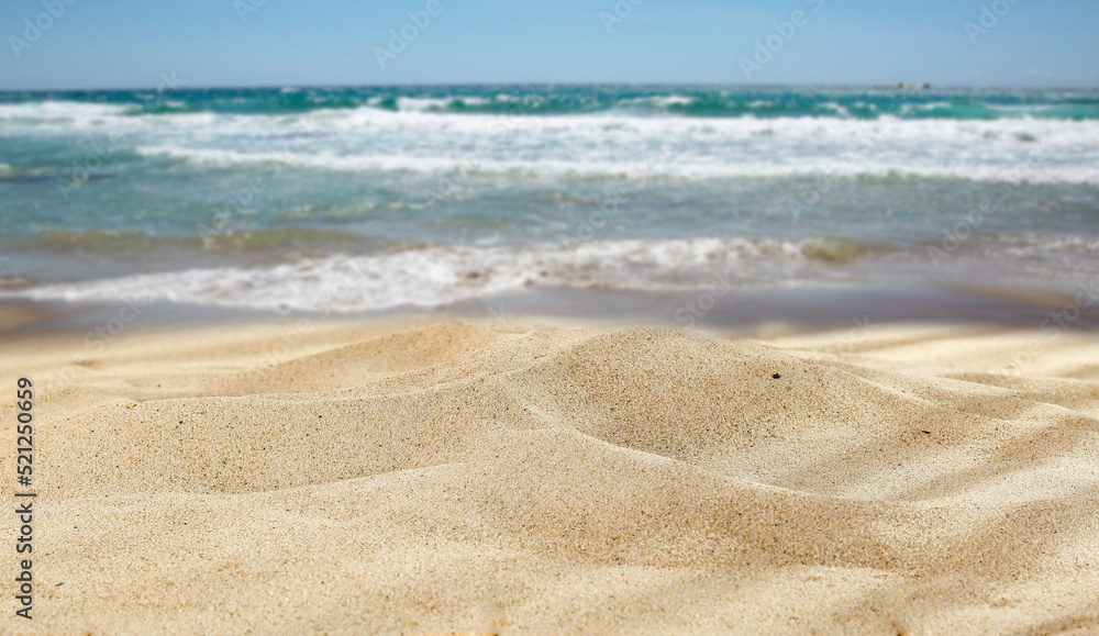 Free place in the sand on the beach, on the seashore on a beautiful holiday day Free place in the sand on the beach, on the seashore on a beautiful holiday day