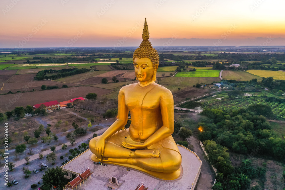 Obraz premium Big Buddha during sunset at Wat Muang in Ang Thong, Thailand