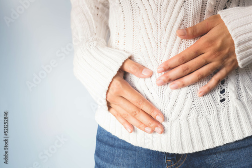 Wallpaper Mural A woman with indigestion symptoms. eating disorder Torontodigital.ca