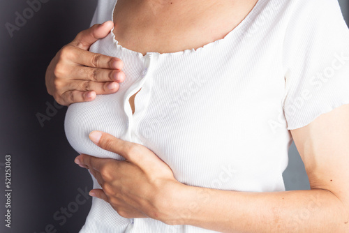 Wallpaper Mural Woman checking her breasts for signs of breast cancer, mammogram Torontodigital.ca