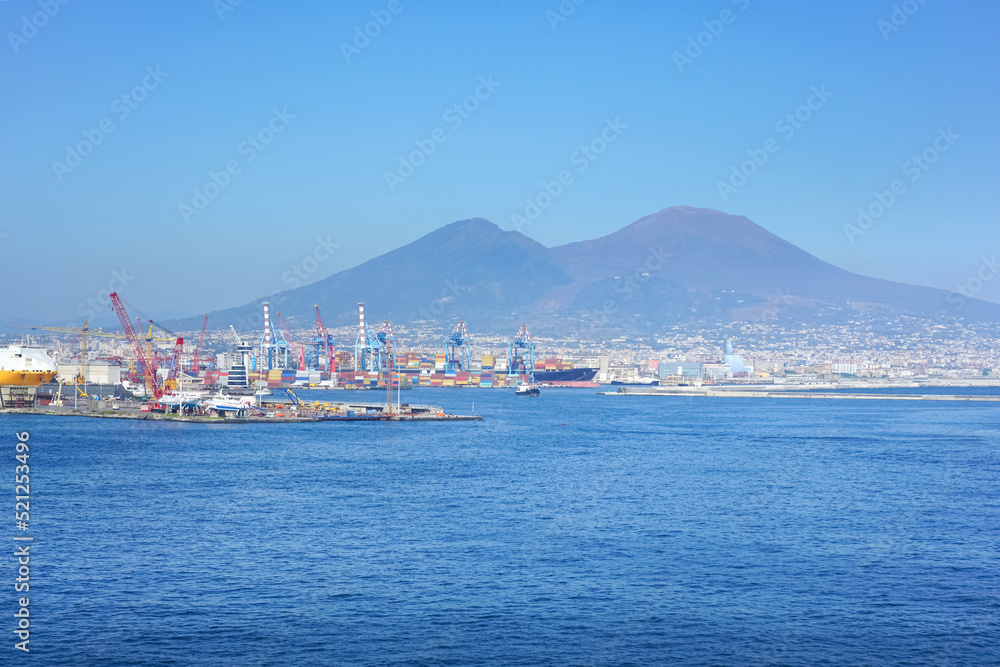 View to Naples cargo port and volcano Vesuvius, Italy