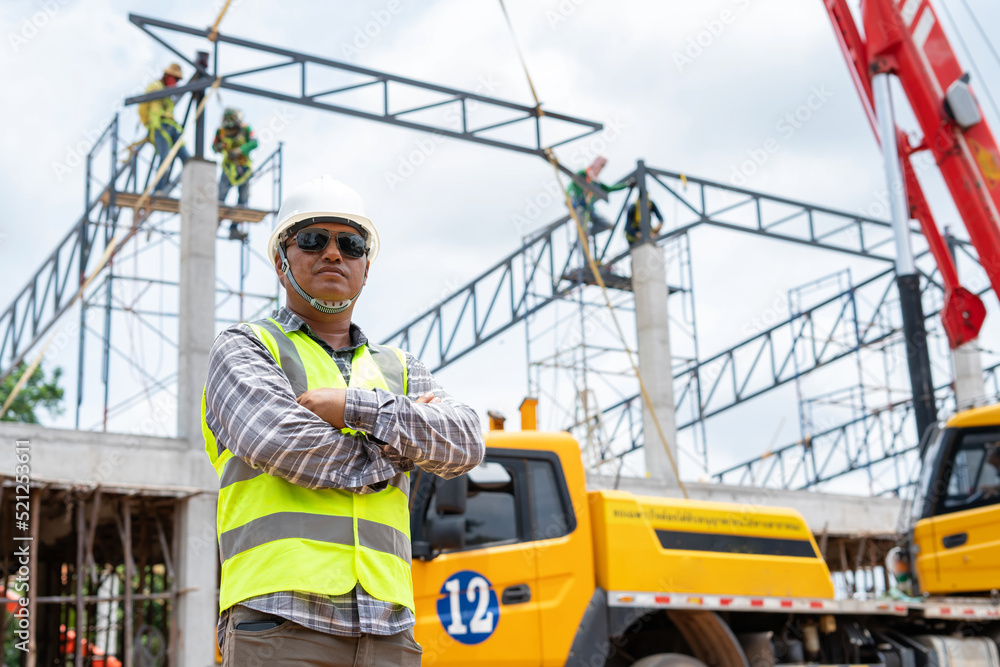 Fototapeta premium Construction engineers inspect the orderliness of the factory construction site.