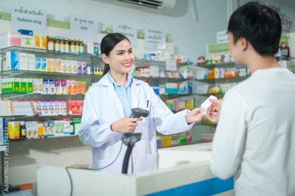 Female pharmacist counseling customer about drugs usage in a modern pharmacy drugstore. Female pharmacist counseling customer about drugs usage in a modern pharmacy drugstore.