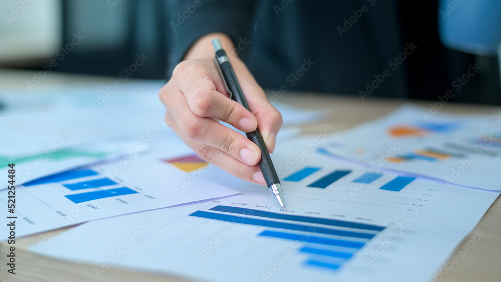Top view of Documents with analytics data lying on table,selective focus. Top view of Documents with analytics data lying on table,selective focus.