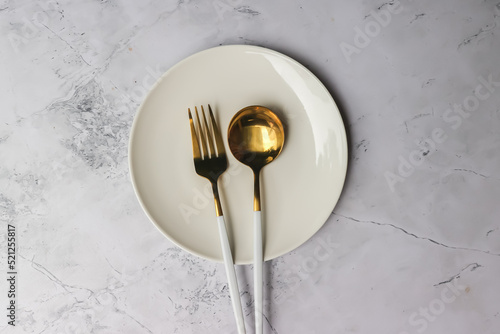 fork and spoon on plate 