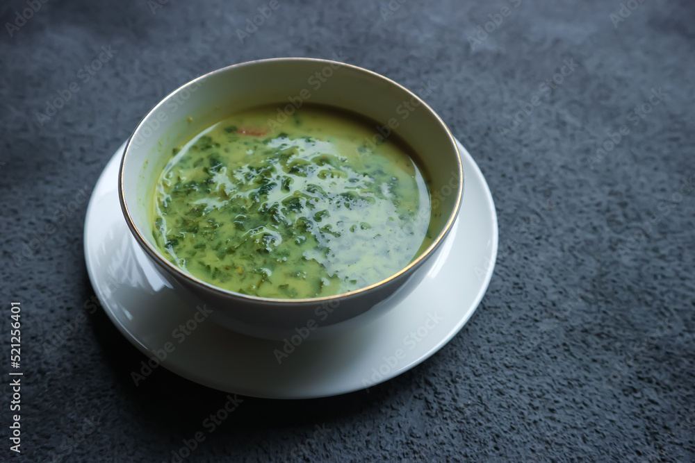 mashed cassava leaf vegetables in a bowl mashed cassava leaf vegetables in a bowl