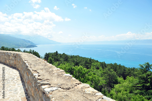 View from Samuel s Fortress overlooking lake Ohrid in Macedonia on a sunny summer day. Ruin walls partly visible in horizontal image.