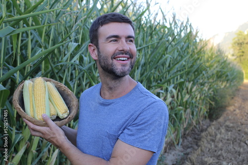 Farmer in beautiful corn fields © ajr_images