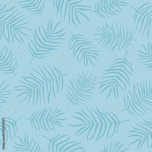 Palm leaves seamless pattern. Blue plants on blue background